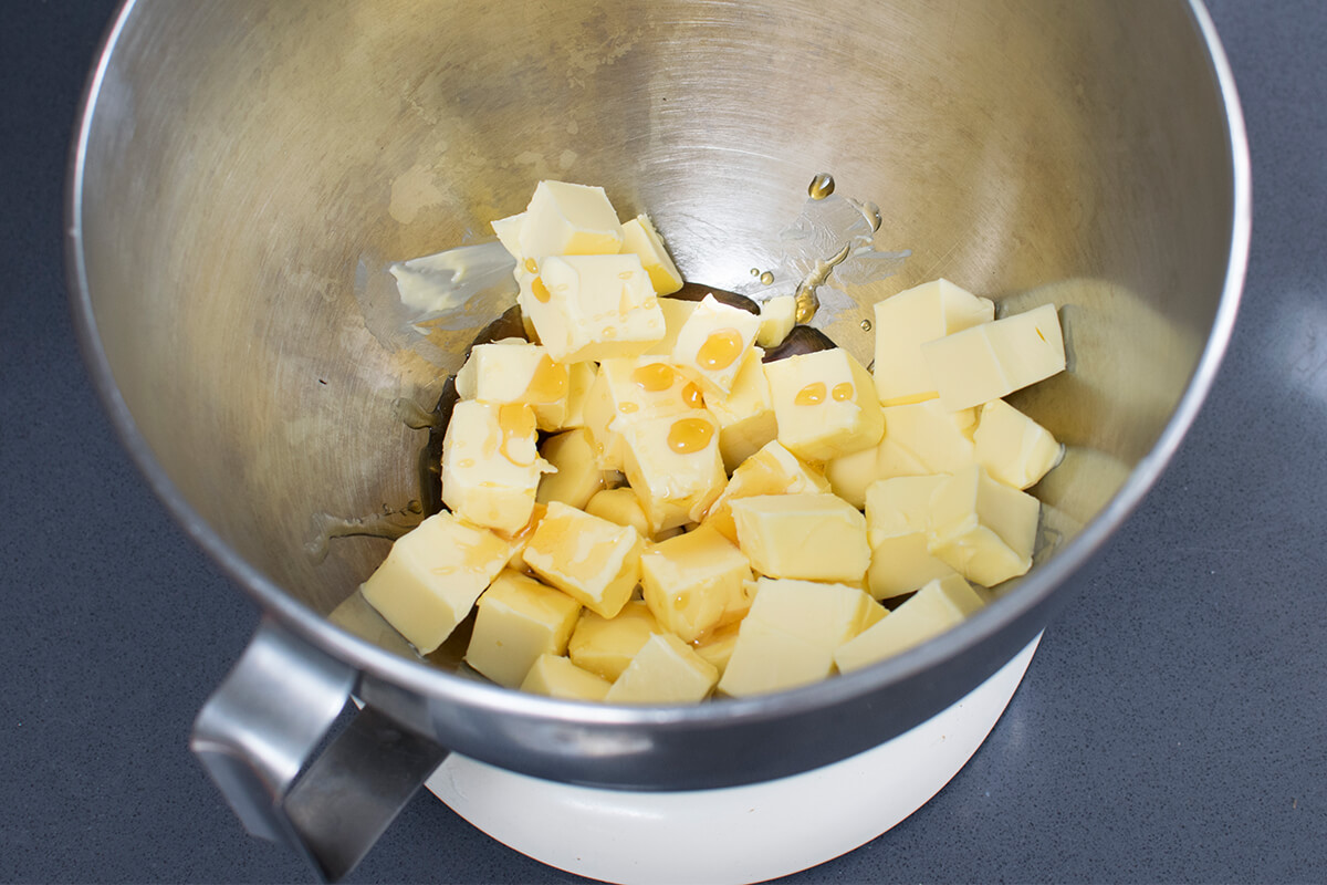 A bowl of butter with maple syrup and vanilla extract