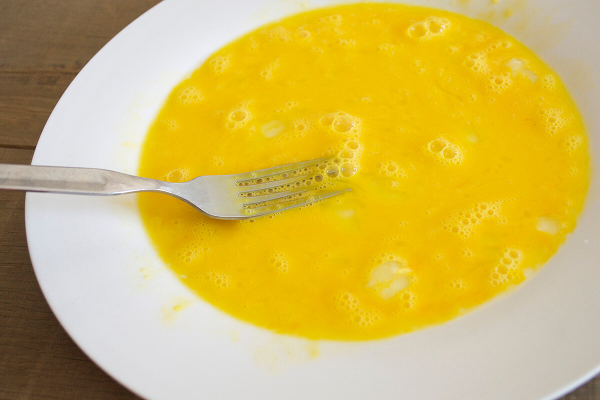 Whisked eggs in a bowl