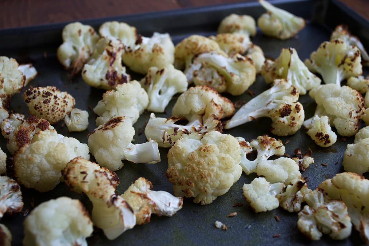 Roasted cauliflower on roasting tray