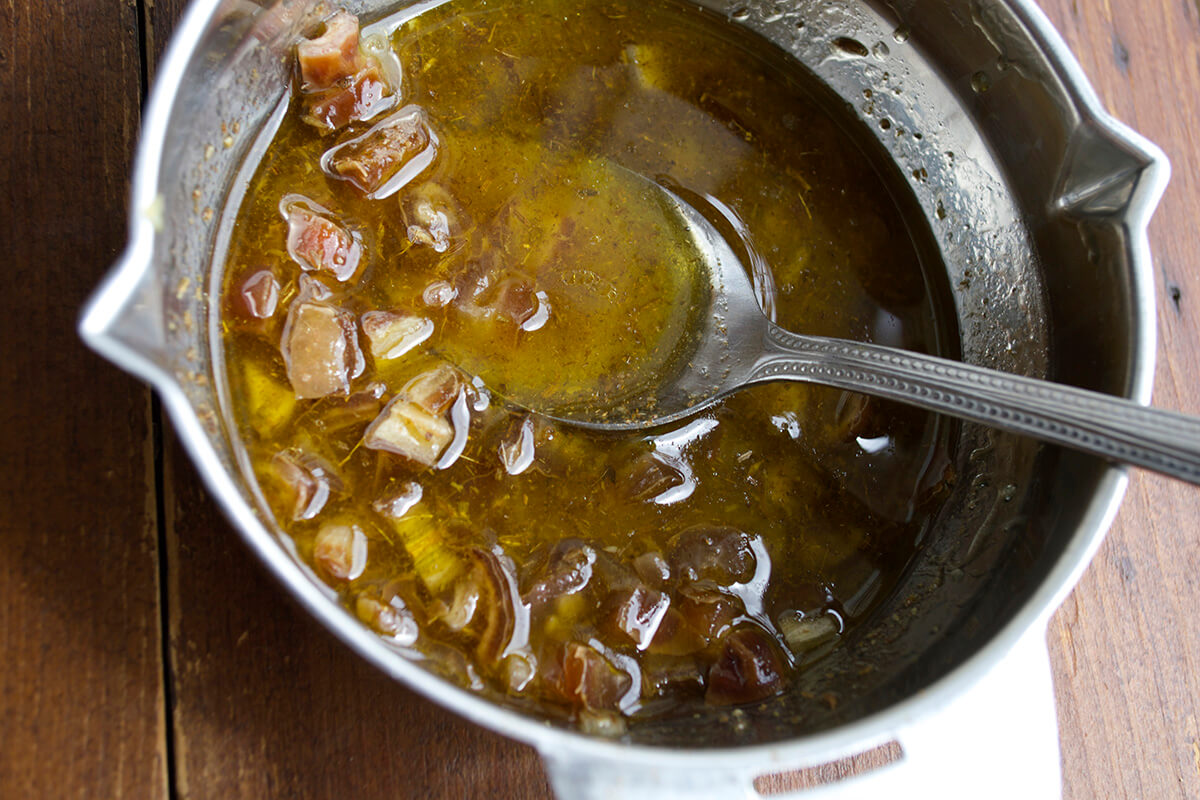 Salad dressing being made